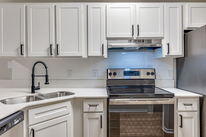 Updated kitchen fixtures and hardware at The Crest at River District, Fort Worth TX